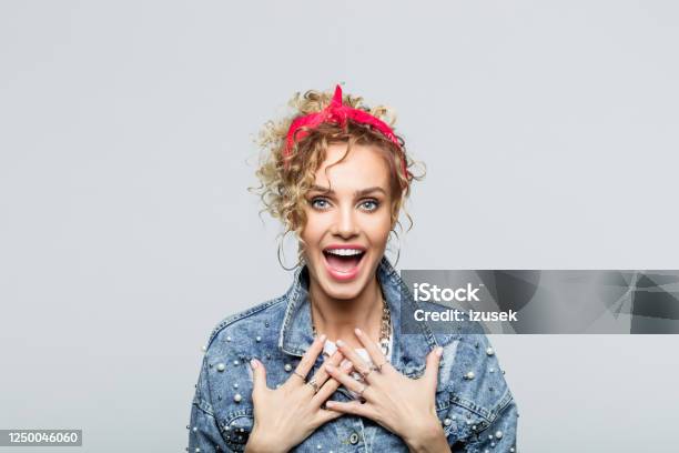 Portrait Of Surprised Young Woman In 80s Style Outfit Stock Photo - Download Image Now