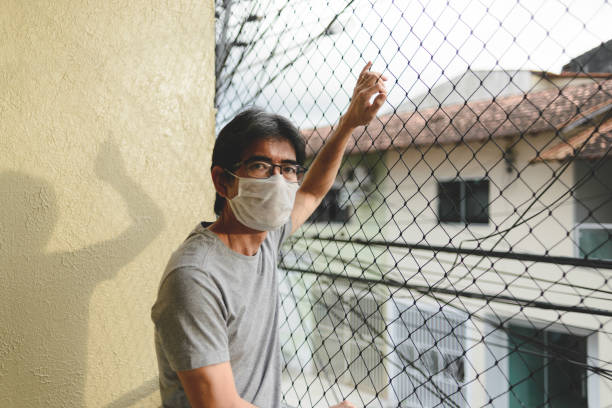 istock Mature asian man in self isolation at home 1250046184