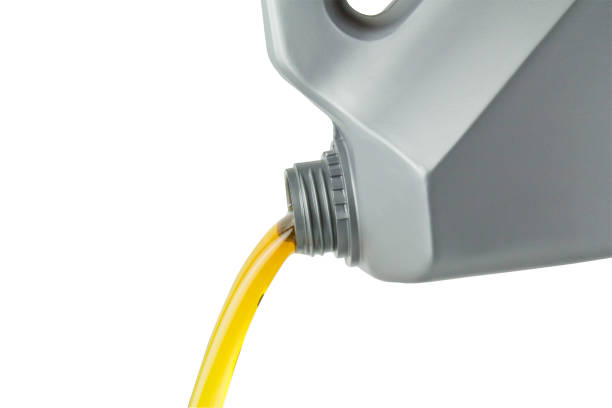 istock pouring motor oil from silver plastic canister isolate on white background with clipping path. 1250047634