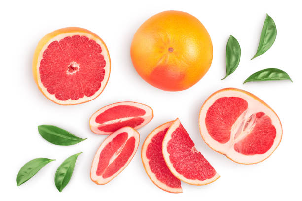 istock Grapefruit and slices with leaves isolated on white background. Top view. Flat lay. With clipping path and full depth of field 1250048058