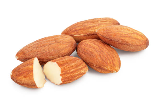 istock Almonds nuts isolated on white background with clipping path and full depth of field. 1250049387