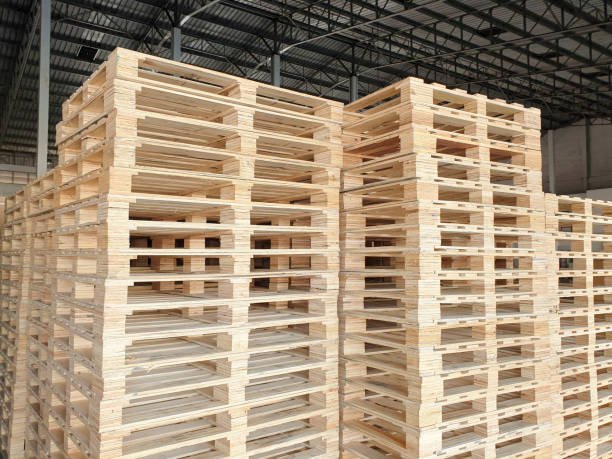 istock Stack of wooden pallets at the warehouse. 1250049514