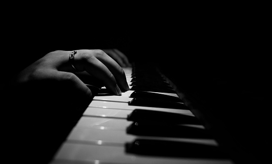 Playing piano in dark