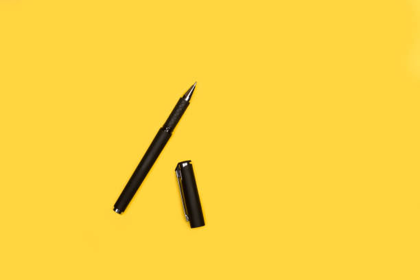 Black outline of the hand holding a pen