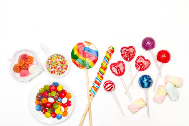 istock Assorted candies and lollipos on a white background 1250053391
