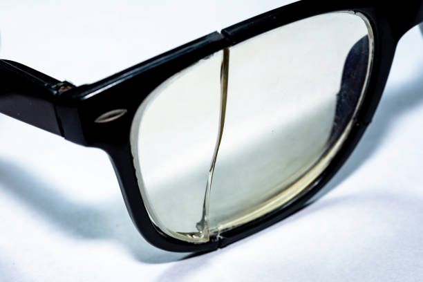 istock Close up of Broken glasses on White Background. 1250058101