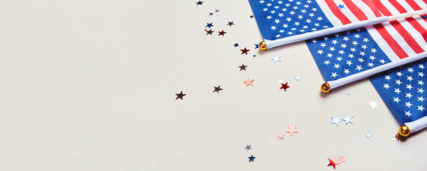 istock Festive background with US flags and confetti. 1250061092