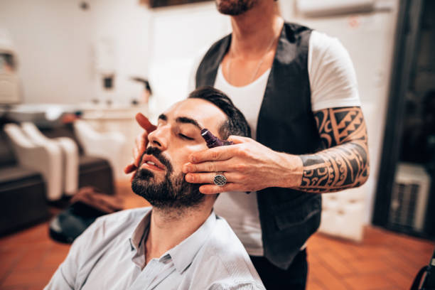 istock man at the barber shop 1250061271