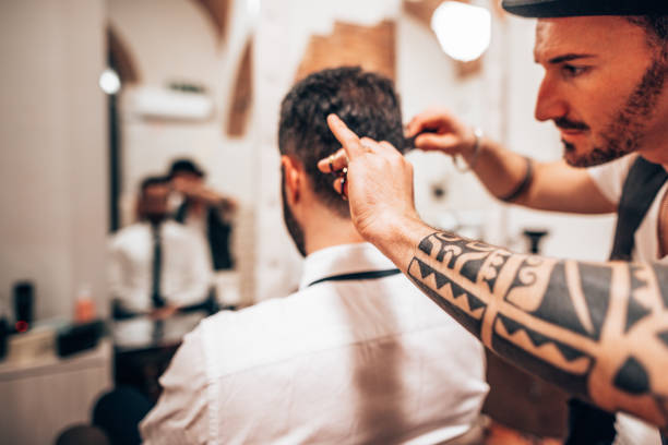 istock man at the barber shop 1250062474