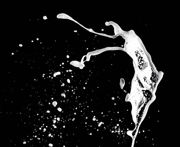 istock White bubble foam splash with water splash on a black background. 1250065484