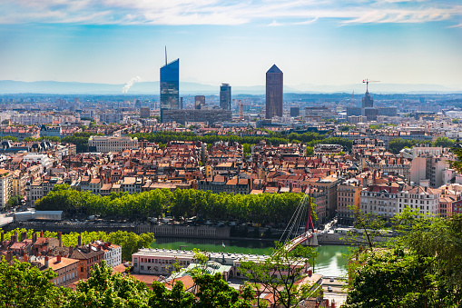 Majestic cityscape, high angle view on Lyon with the Part-Dieu business district skyscrapers in background, during a sunny summer day. Taken in Lyon, Unesco World Heritage Site, in Rhone department in Auvergne-Rhone-Alpes region, in France (Europe).