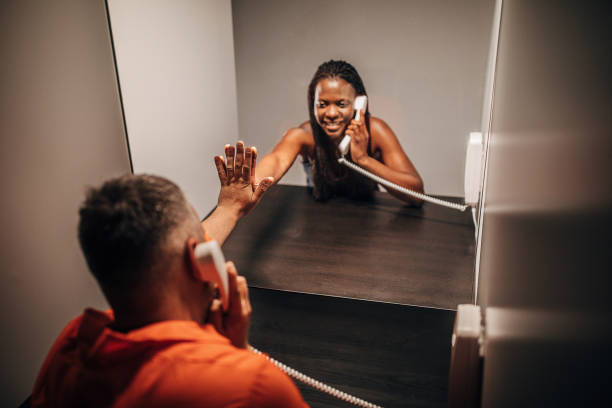 istock Young wife visit her husband in prison 1250069650