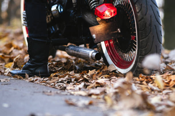 Close up photo of motorcycle exhaust while strarting up engine