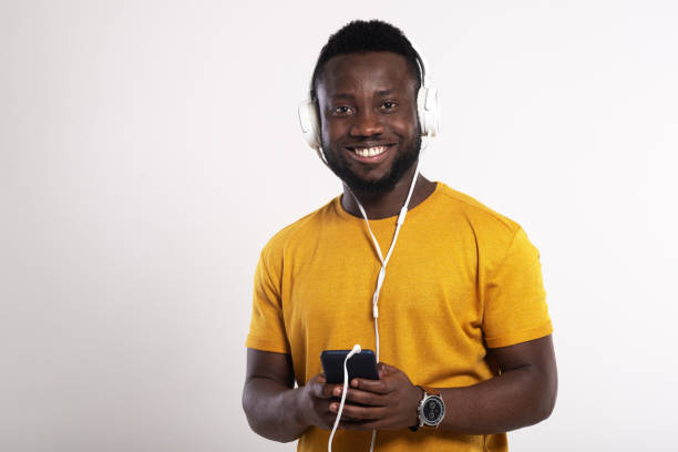 istock Portrait of a young African-American using smartphone 1250074332