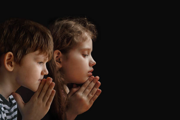 istock Little child folded his hand with praying. 1250077527