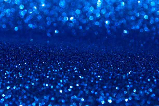 istock Abstract background of blue glitter texture 1250081764