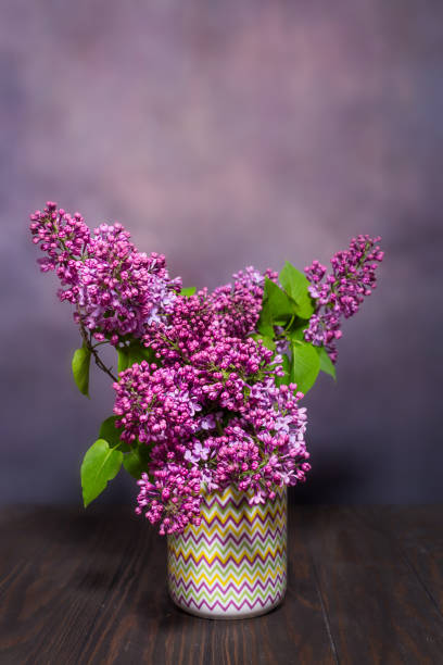 istock Bouquet of lilacs in a vase 1250082205