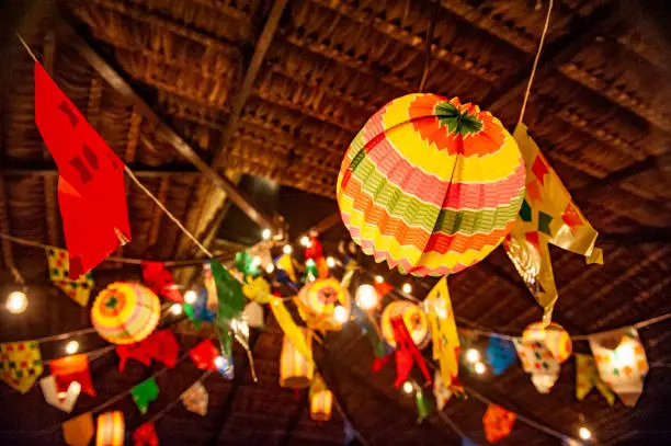 Photo of Traditional flags and lanterns of June festivities in northeastern Brazil. Background colorful.