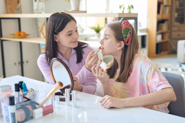 istock Teaching daughter to do makeup 1250088422