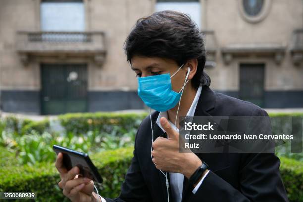 Men Covering His Face With Protective Mask Stock Photo - Download Image Now - Adult, Adults Only, Allergy