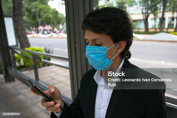 Men Covering His Face With Protective Mask Stock Photo - Download Image Now - Adult, Adults Only, Allergy