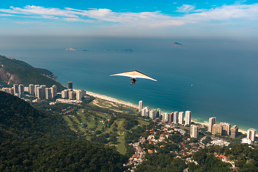 Hang gliding off Pedra Bonita is a popular thrill-seeking activity. Overlooking Rio de Janeiro, Brazil