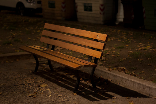 bench into a dark city park