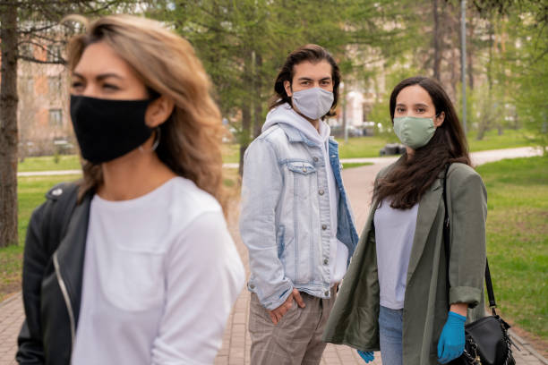 istock Looking at woman in mask during coronavirus 1250094202