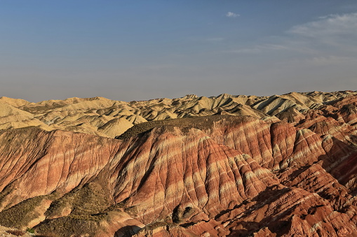 Spectacular colorful rusty sandstone and siltstone landforms of Zhangye Danxia-Red Cloud Nnal.Geological Park so called Rainbow Mountains-E.foothills of the Qilian Range. Zhangye-Gansu province-China.