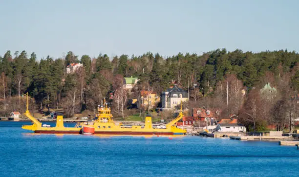 Yellow ferry for transporting cars and people from the islands of the Stockholm archipelago to the mainland