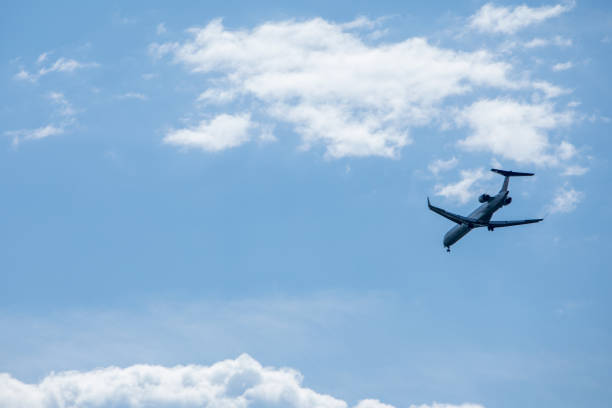 istock airplane in sky travel concept 1250098304