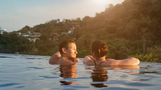 istock muscular guy approaches brunette admiring hilly landscape 1250105066