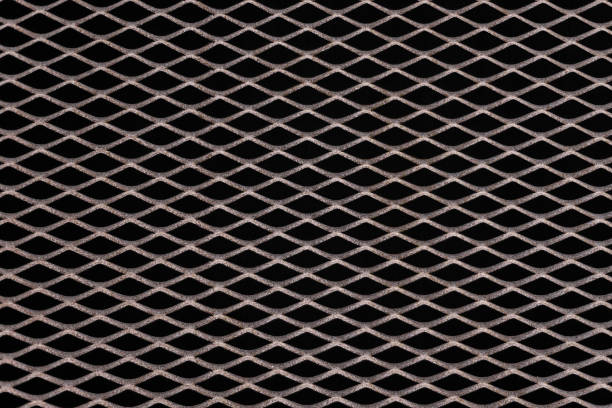 istock Rusty metal grid with geometric pattern of rhombi, background 1250108175