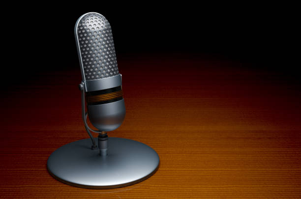 istock Vintage microphone on dark wooden table, 3D rendering 1250108679