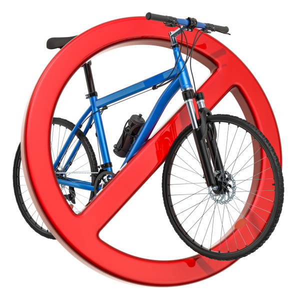 No bikes. Round road sign on a metal pole isolated on white, vertical photo