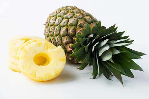 Marinated sweet pineapple rings in the bowl