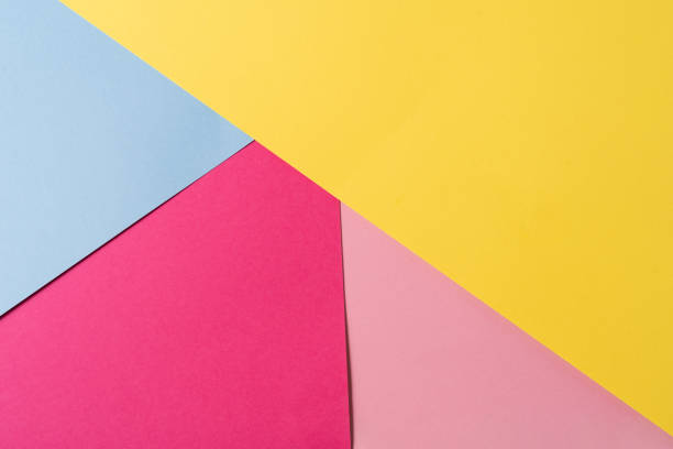 istock Pink,blue and yellow colored abstract paper , with geometric shape for using as background. 1250113181