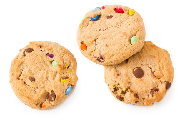 istock Chocolate chip cookies isolated on white background. Sweet biscuits. top view 1250114353