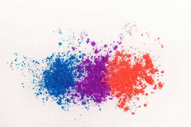 istock Bright eye shadows in different colors of the rainbow, scattered on a white background. 1250115086