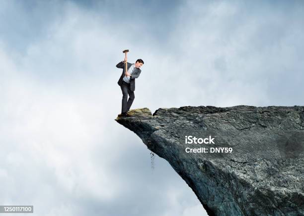 Businessman On Wrong Side Stock Photo - Download Image Now - Mistake, Ignorance, Cliff