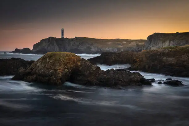 Valdoviño cliffs and Meirás lighthouse in Galicia, Spain at dawn in Valdoviño, GA, Spain