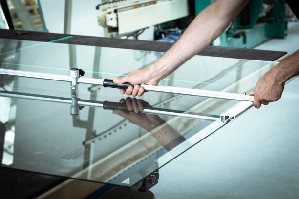 istock A worker cuts glass in a glass workshop 1250118121