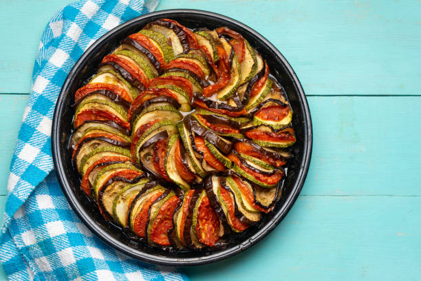 istock French baked ratatouille on turquoise background 1250121819