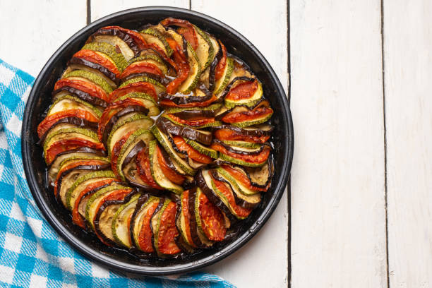 istock French baked ratatouille on white background 1250122754