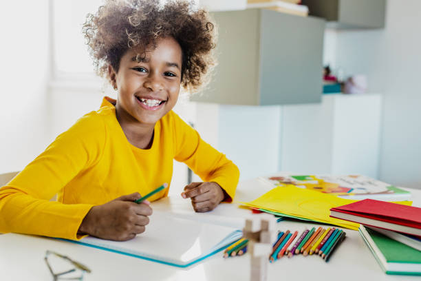 istock Young girl studying at home 1250125216