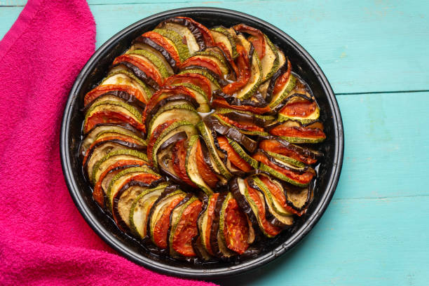 istock French baked ratatouille on turquoise background 1250126320
