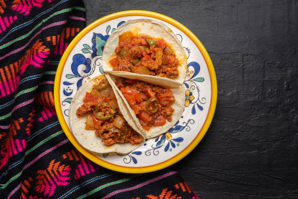 istock Mexican chorizo tacos on dark background 1250130163