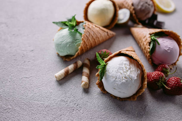 istock Ice cream on grey table, seasonal food background 1250131143