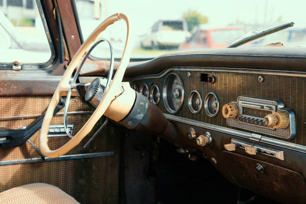 istock Close-up wheel and panel of old vintage rusty abandoned car 1250133516