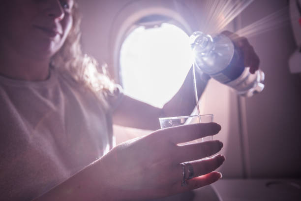 istock Pouring water in drinking glass. 1250133523